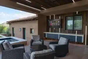 Control4 promotional installation showing linear accent lighting around an outdoor living area